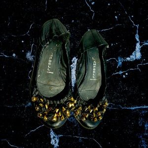 Black ballet flats with gold stud detailing